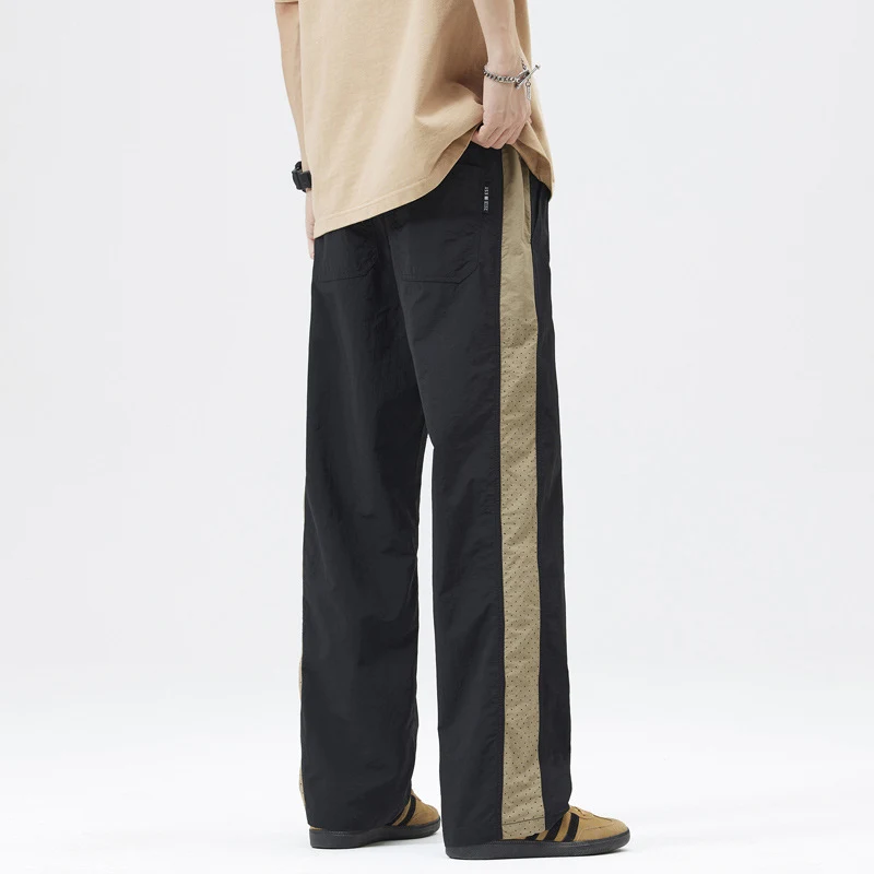 Pantalones casuales finos de tres barras para hombre Estilo y comodidad diarios para un look moderno y relajado. Perfectos para cualquier ocasión.