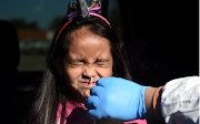 Valerie Dominguez, whose results came back negative, is tested for coronavirus disease at United Memorial Medical Center in Houston, Texas, US on December 9, 2020. 
