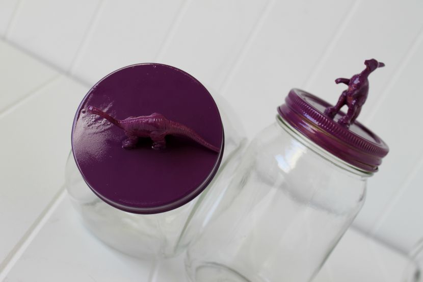 You can use jars of all sizes and shapes. Just find plastic dinosaurs in a size that will compliment your container.