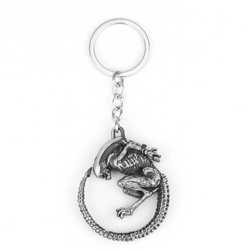 Porte-clés de bataille extraterrestre simple et créatif. Design unique et original. Idéal pour clés, sacs à dos. Un accessoire amusant et pratique pour tous.
