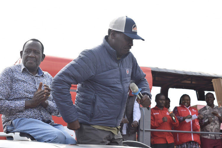 Agriculture CS Peter Munya tries a jig at Ruiri, Meru on Thursday, June 23