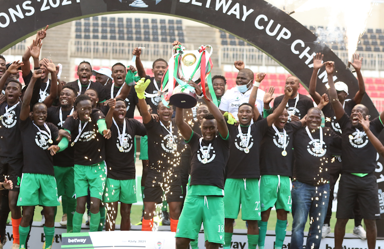 Gor Mahia players celebrate with the Betway Cup after beating AFC Leopards in the final