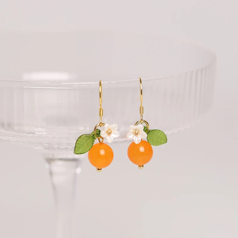 Title 4, Boucles doreilles asymétriques orange en argen...