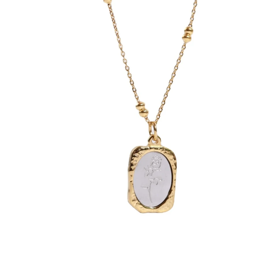 Collier en acier inoxydable avec miroir magique, ornement vintage médiéval, rose et fleur, design de niche, un bijou unique.
