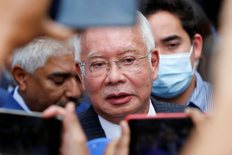 Former Malaysian prime minister Najib Razak speaks to journalists outside the federal court during a court break, in Putrajaya, Malaysia, on Tuesday. Picture: LAI SENG SIN/REUTERS