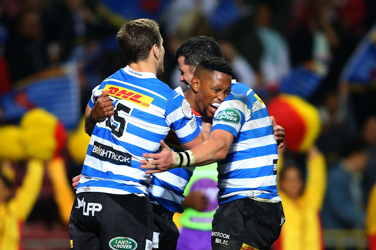 SP Marais of Western Province and Ruhan Nel congratulate Craig Barry for scoring a try during the Currie Cup match against the Blue Bulls at Newlands on July 13 2019.