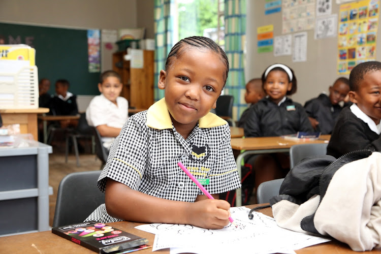 Kamilah Mabizela happy to be starting grade 2 at Seven Star Primary School in Cambridge, East London.