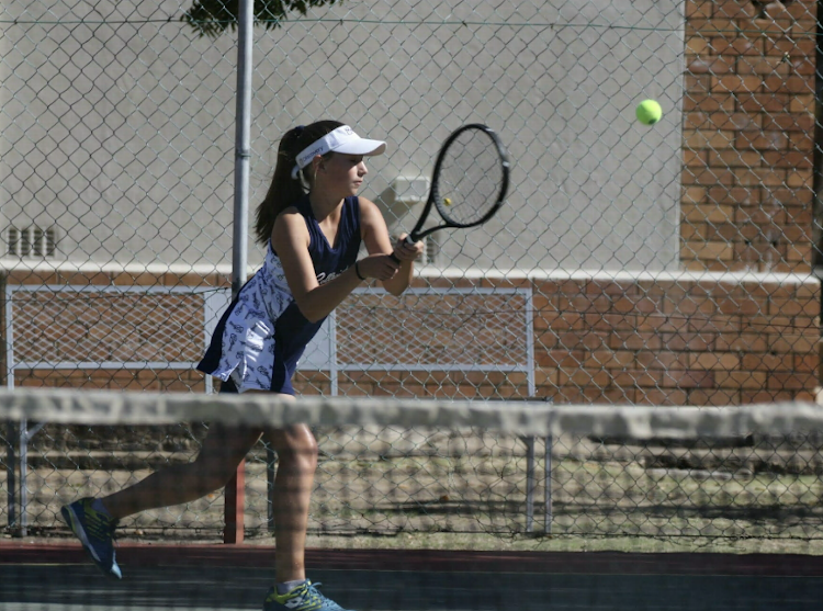 Collegiate Junior’s Josie Turner returns a backhand during a match in the Jocelyn Marais Tennis Tournament, which was held in Graaff-Reinet recently