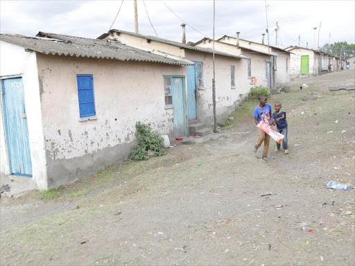 Minors play in County council estate in Naivasha where Nakuru County government is seeking millions of shillings from the tenants over accrued rent arrears