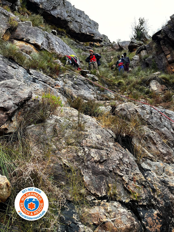 On several occasions rescuers had to use ropes to safely navigate steep and wet sections of the trail.