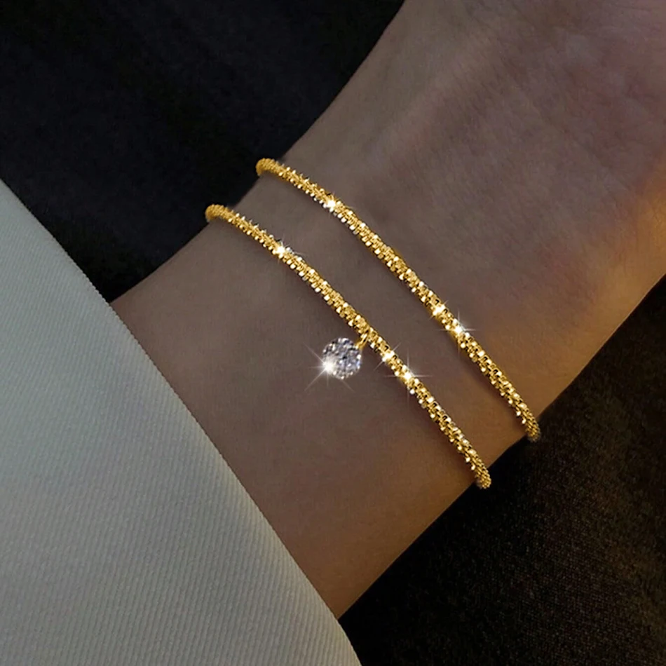 Damesarmband met gouden en zilveren strass-steentjes, elegante sieraden, perfect voor elke gelegenheid, voegt glans en stijl toe.
