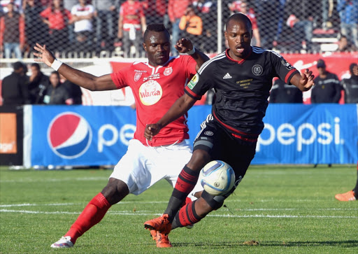 Gift Motupa of Orlando Pirates and Franck Kom of ES Sahel during the CAF Confederation Cup Final 2nd Leg match between Etoile du Sahel and Orlando Pirates. Picture Credit: Gallo Images