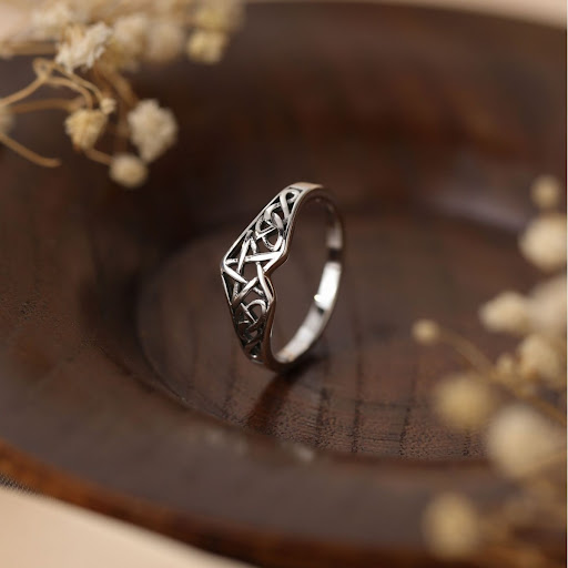 Title 5, Pure Silver Star Distressed Female Ring, a styl...