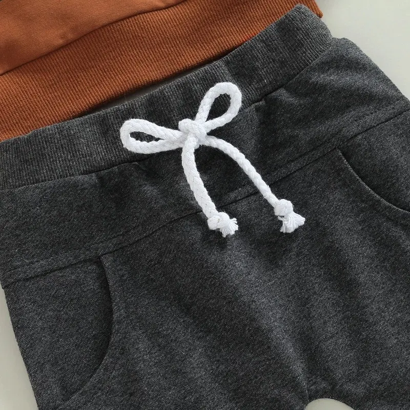 Ensemble deux pièces pull à col rond et manches longues avec imprimé lettres et pantalon, idéal pour un look décontracté et tendance au quotidien