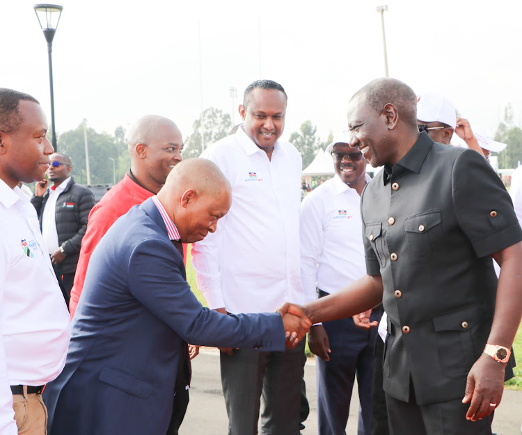 New WRC Safari Rally Project CEO shakes hands with President William Ruto during the ground breaking of Talanta Hela Stadium last week