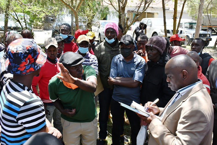 Naivasha deputy county commissioner Mutua Kisulu engages fishermen after a fish trader Simon Thuku was on shot dead by officers from the Kenya Coast Guard services on Wednesday, February 16.