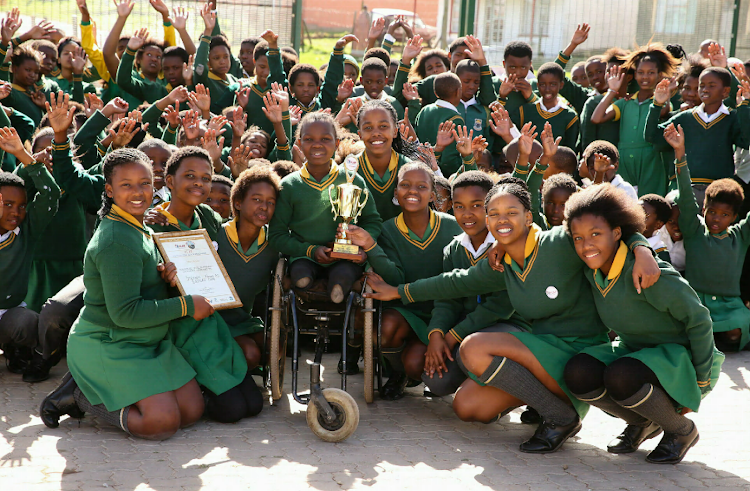 Eight grade 7 pupils from Stephen Nkomo Primary School in KwaNobuhle, Uitenhage, won first place in their division at the 2019 Youth Citizen Action Programme Championships with their project on disabilities. The group helped Siphosethu Ncandana (in the wheelchair) to get used to her new prosthetic legs. The winning team is, front from left, Phumelela Mtila, 12, Alulutho Ncandana, 12, Nwabisa Ngqungwana, 12, Okuhle Menti, 11, Aphiwe Nkayi, 13, Lahluma Mni, 12, Aphelo Majenge, 13, and Aphelele Maqhina, 12