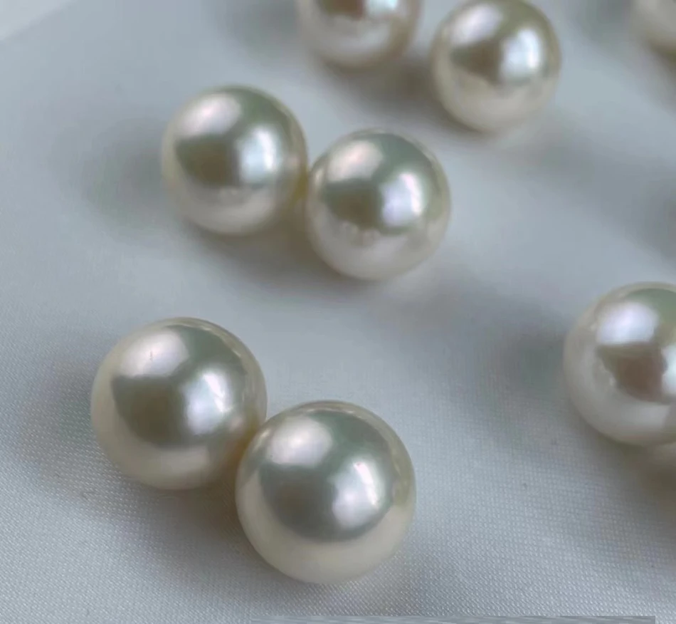 Witte parel oorbellen voor damesmode. Tijdloze elegantie voor elke gelegenheid. Verfraai uw look met deze prachtige oorbellen.