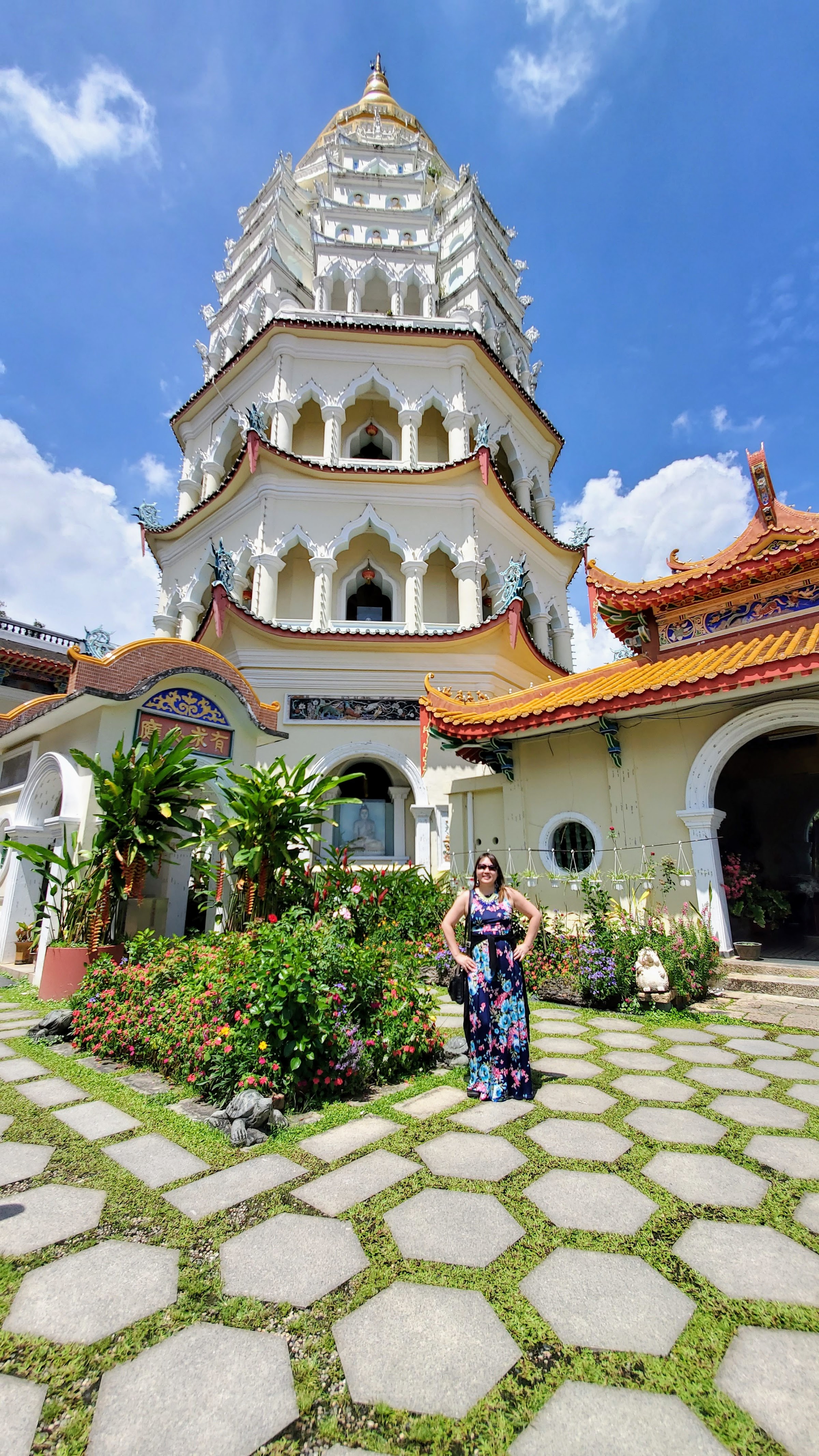 Visiting Kek Lok Si: What makes it unique is that among its millions of Buddhas it shows the blending of cultures that is so representative of Malaysia by including many stylistic representations of Buddha.