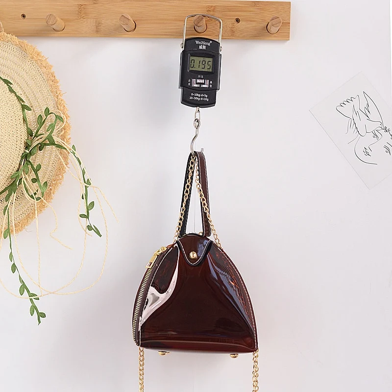 Bolsa Zongzi Triangular com Corrente Leve seus Itens Essenciais com Elegância e Conforto Ideal para Eventos e Uso Diário Design Único e Sofisticado