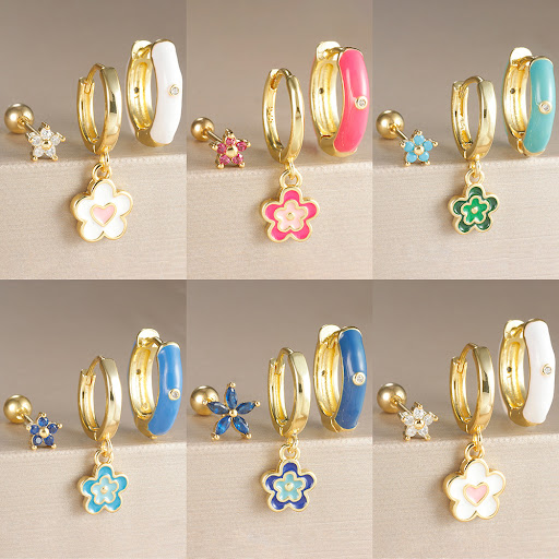 Title 3, Niche Design ear clip earrings, featuring an oi...