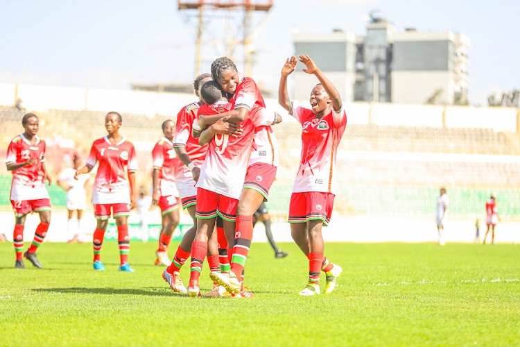 Rising Starlets celebrate after their 6-1 win over Angola on October 8 at the Nyayo stadium