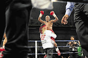 Moruti Mthalane, seen after outboxing Mexico's Julo Cesar Miranda to win the IBF flyweight title in 2009, is expected to earn next to nothing for his mandatory defence