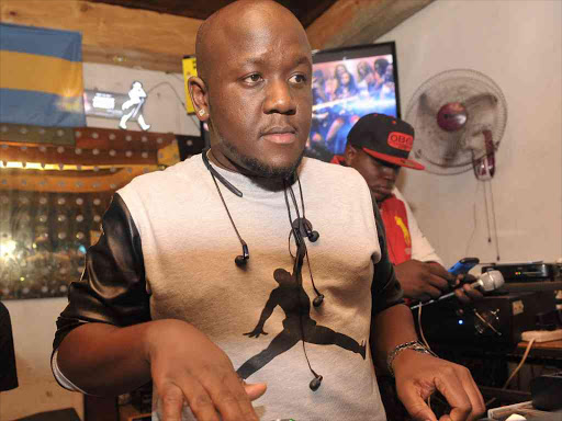 DJ Joe Mfalme on the wheels of steel at Natives Bar & Grill.