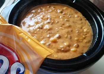 Chili Cheese Dip in small crockpot to keep it warm.