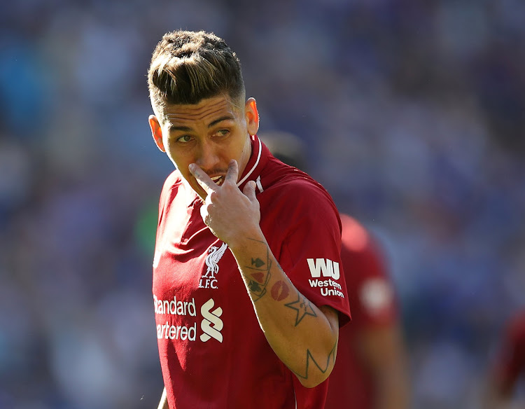 Liverpool's Roberto Firmino reacts during their match against Cardiff City