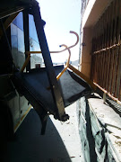 A Robben Island Museum bus driver apparently failed to check the doors before driving off, resulting in the injury of tourists. 