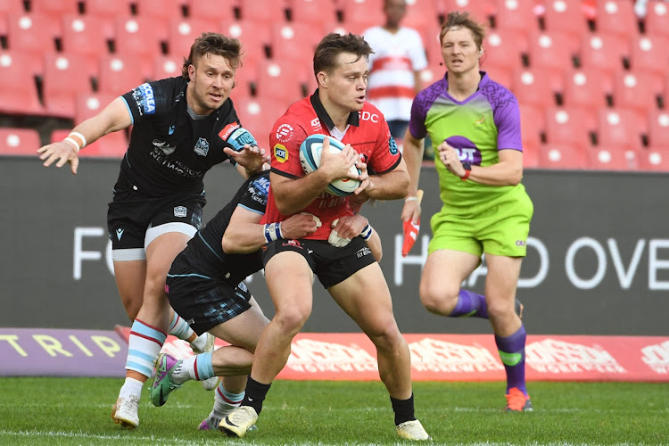 Quan Horn of the Lions holds on to the ball during their United Rugby Championship match against Glasgow Warriors at Emirates Airline Park.