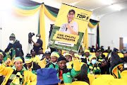 A member of the ANC holding a poster of Stan Mathabatha who was re-elected chairperson of the ANC in Limpopo at the party's 10th provincial conference held at The Ranch resort in Polokwane.