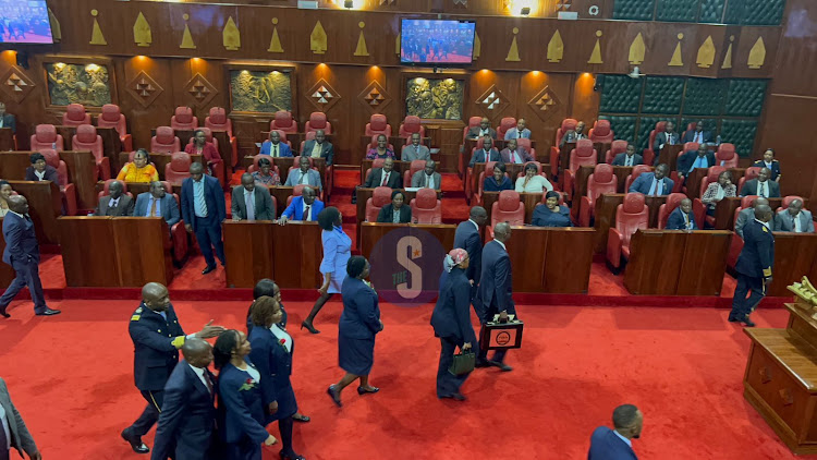 Nairobi CEC for Finance Charles Kerich and Chief Officer finance Asha Abdi being escorted in the chambers ahead of the budget statement reading at the county assembly on June 29,2023.