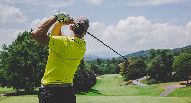 Golfer playing golf