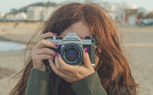 Girl taking pictures