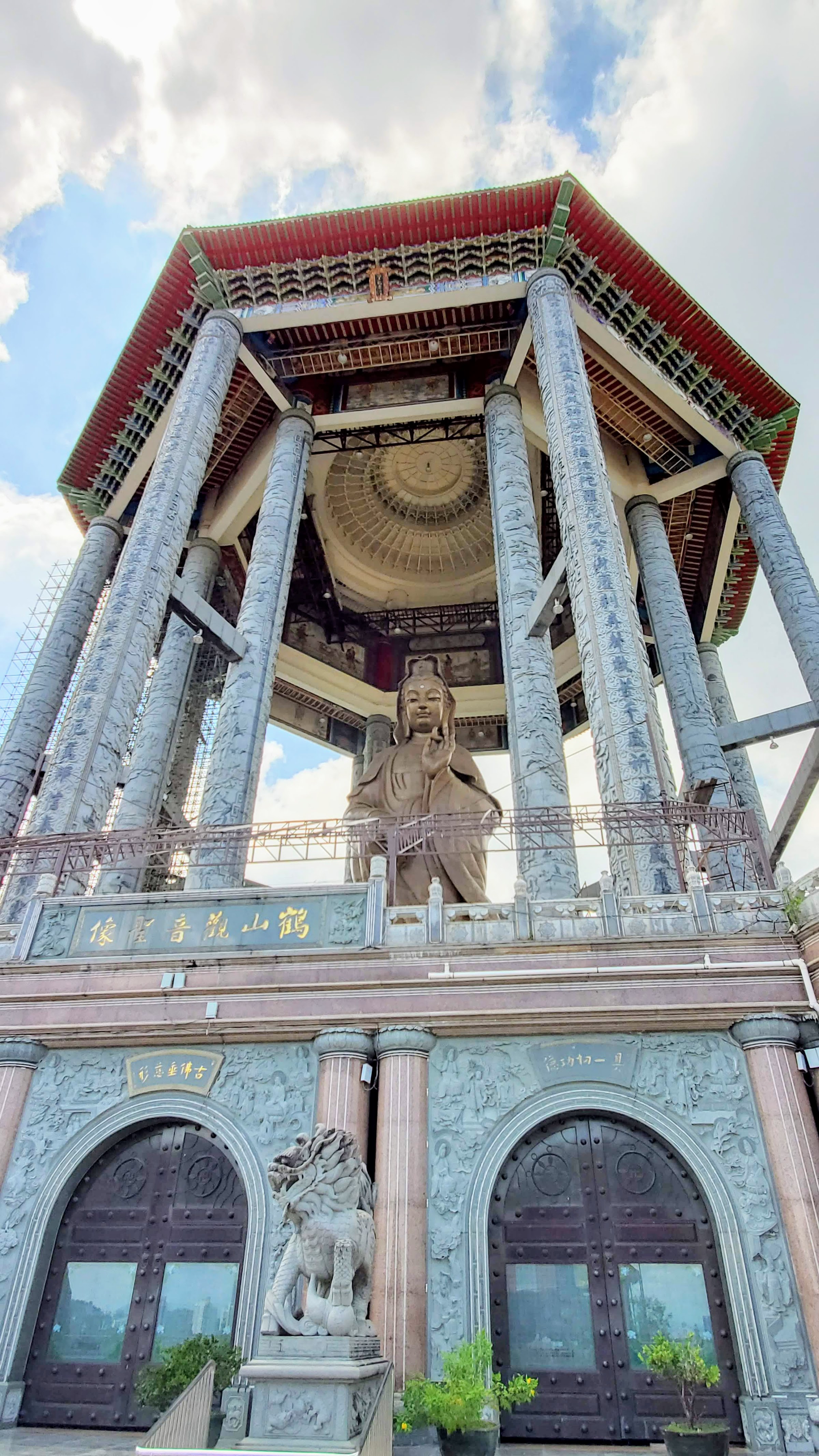 Visiting Kek Lok Si: What makes it unique is that among its millions of Buddhas it shows the blending of cultures that is so representative of Malaysia by including many stylistic representations of Buddha.