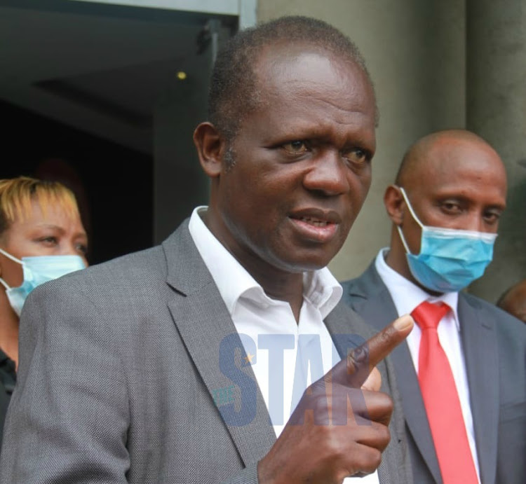 Jubilee Party secretary general Raphael Tuju and MCA Abdi Guyo at the party offices in Pangani, Nairobi, on Wednesday, June 10, 2020.