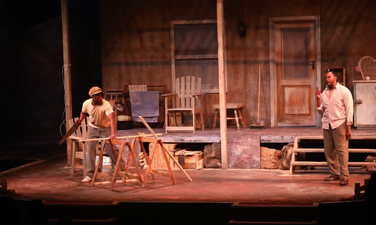 Atandwa Kani's character Cory listens to Tumisho Masha, who plays the role of his father Troy Maxson, as he tells him about the importance of erecting the fence in the play 'Fences'.