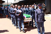 SAPS members as  pallbearers at warrant officer Dalmain Morris' funeral