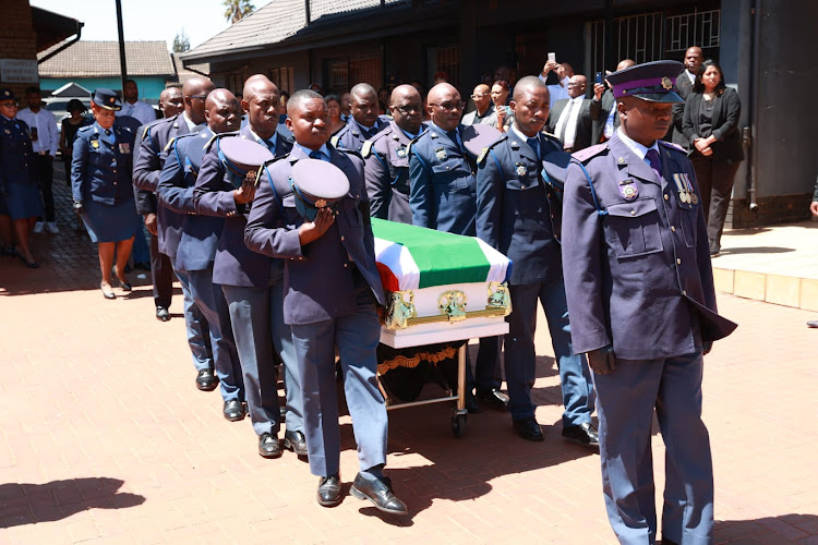 SAPS members as pallbearers at warrant officer Dalmain Morris' funeral