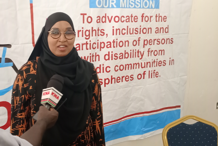 Northern Nomadic Disabled Persons Organization (NONDO) team leader Fatuma Mohamed speaking to the press at a Garissa hotel.