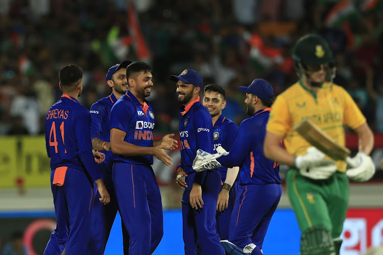 India bowler Avesh Khan celebrate the wicket of Dwaine Pretorius of South Africa during the 4th T20 match at the Saurashtra Cricket Association Stadium.