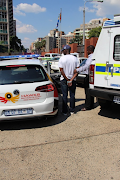 The Hawks in Gauteng have arrested two of their own members and a Hillbrow police detective for armed robbery‚ in which they netted a share of R1-million each. Image: SUPPLIED