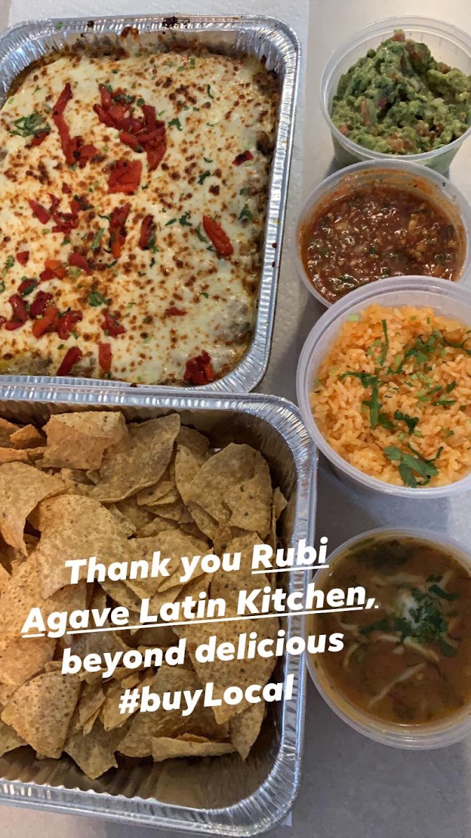 Puerto Rican lasagna, rice and beans, chips and salsa