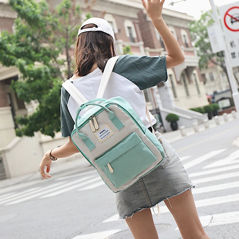 Oxford cloth wearable shoulder bag, water-resistant, lightweight and perfect for travel and everyday use. Comfortable an