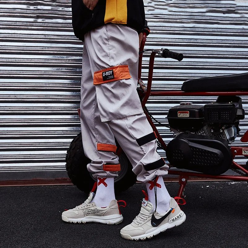 Men's hip-hop beam pants, offering a relaxed fit and unique style. Perfect for urban wear and comfortable everyday use, 