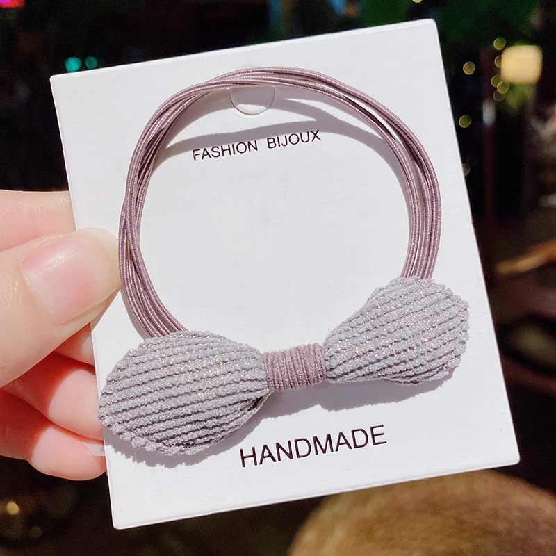 Children's hair ties that won't hurt hair. Bowknot and rabbit ear rubber bands. Cute and gentle hair accessories for gir