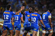 Siya Kolisi (captain) of the Stormers celebrates the try with Damian de Allende of the Stormersduring round 5 of the Super Rugby match between DHL Stormers and Jaguares at DHL Newlands on March 15, 2019 in Cape Town, South Africa. 