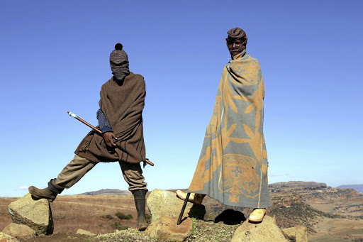 Teboho Mochaoa aka Morena Leraba, left, and a fellow shepherd in the hills of Lesotho. File photo.